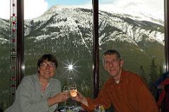 37 Charlotte Ryan And Jerome Ryan Enjoying An Apres Ski Drink At Rimrock Resort Hotel Overlooking Mount Rundle in Winter